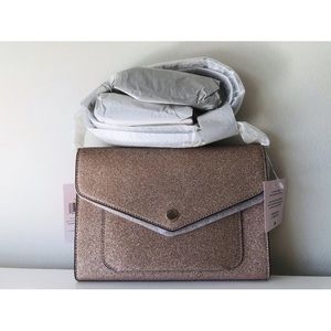 Kate spade rose gold tinsel flap-NWT